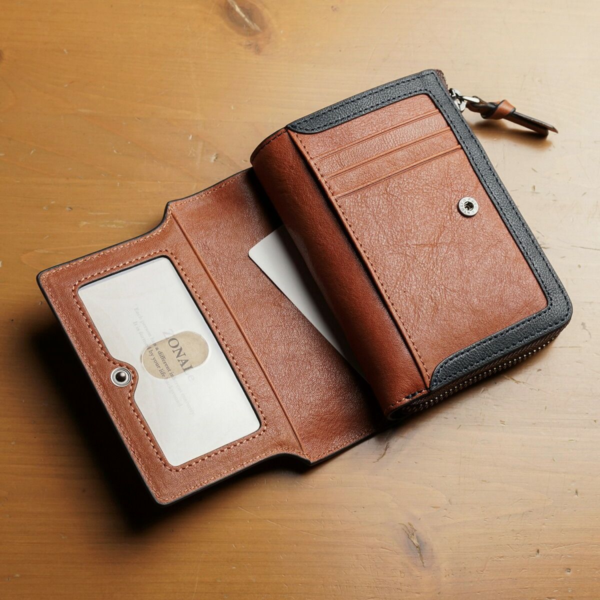 ZONALe(ゾナール)ORLO(オルロ)ラウンド式二つ折り財布中ベラ付き